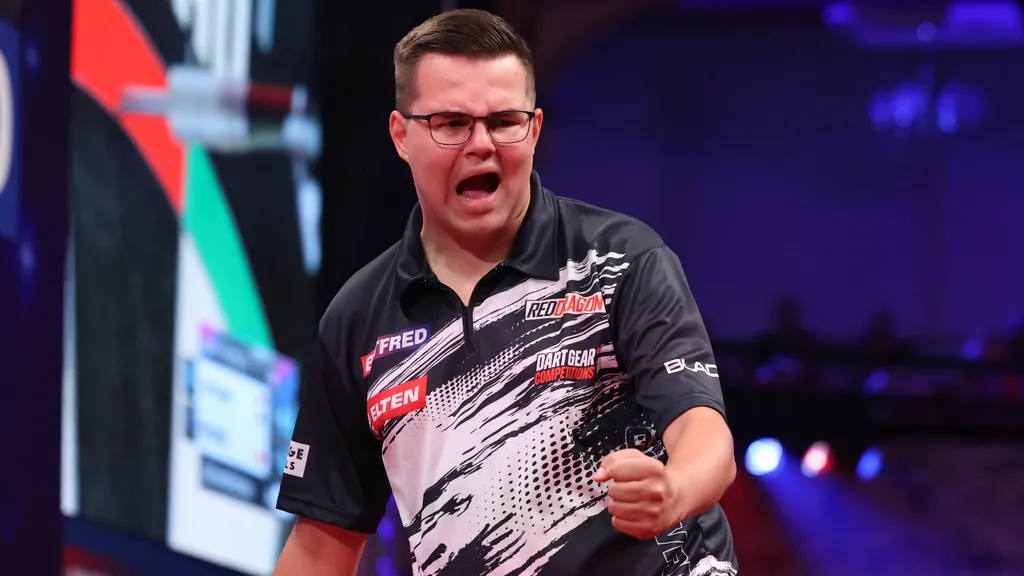 Van Veen reaches World Matchplay quarterfinals after 14-12 win over Nijman; Menzies taken ill with high blood pressure